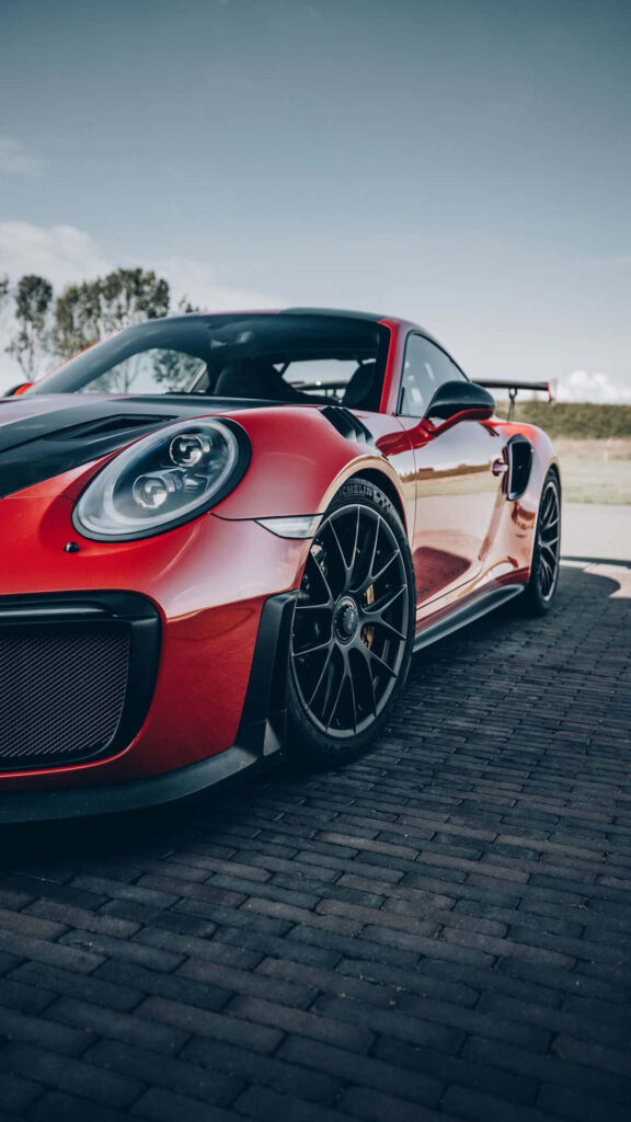 Sleek Red Sports Car Wallpaper - Perfect for Samsung M51 Background