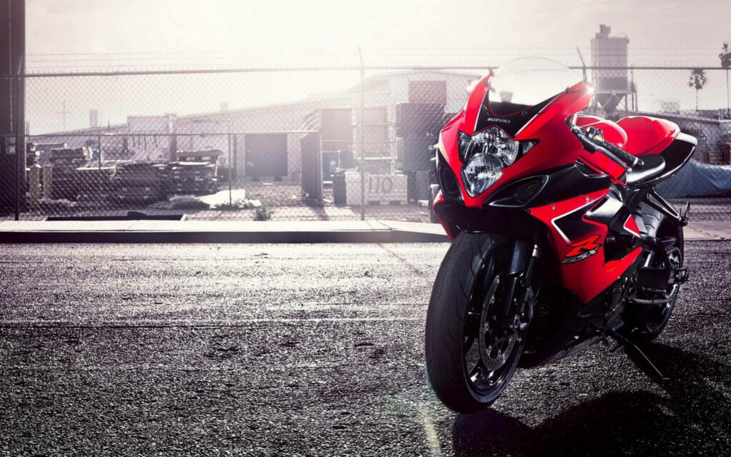 Stunning Red Suzuki GSX-R1000: Urban Industrial Wallpaper Background