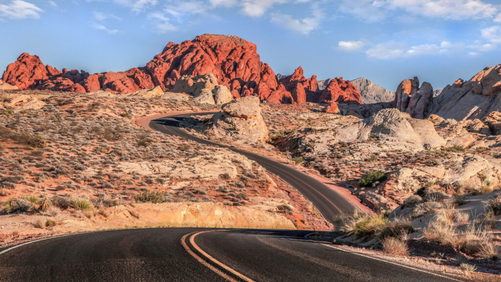 Stunning Reno Desert Wallpaper: Winding Road & Vibrant Cliffs