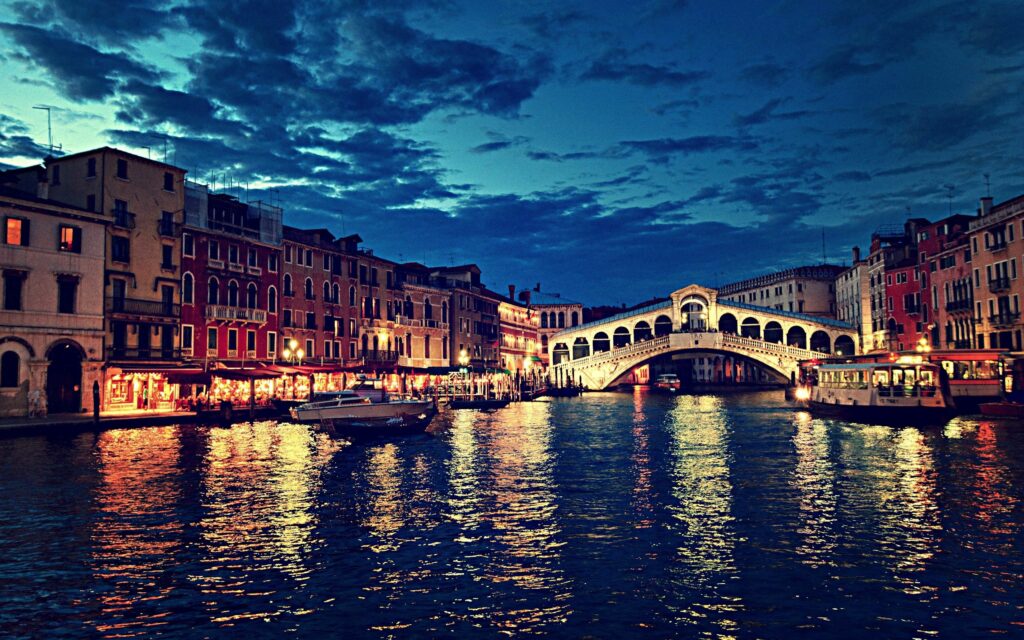 Rialto Bridge at Night: Stunning Venice Wallpaper Background