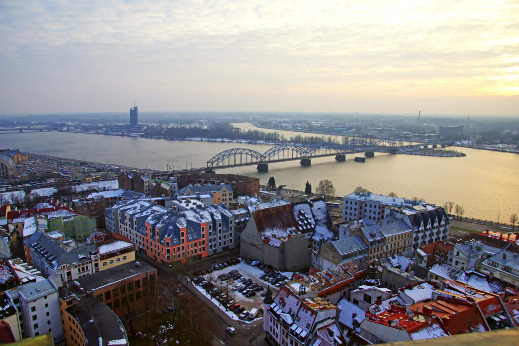 Stunning Riga Cityscape Wallpaper: Iconic Architecture & Daugava River