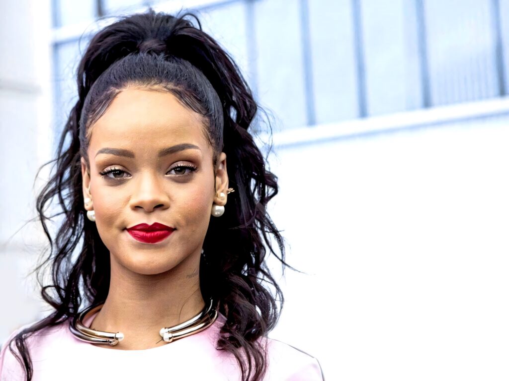 Stunning HD Wallpaper of Rihanna: Stylish Ponytail & Radiant Makeup