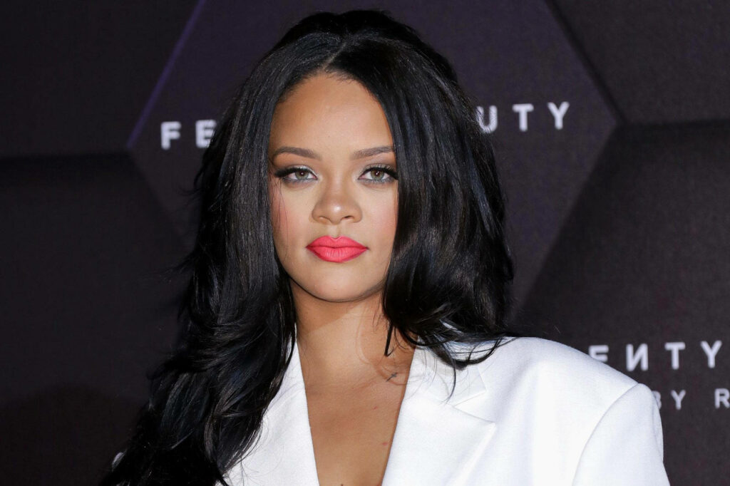 Rihanna Exudes Elegance: Fenty Collection Wallpaper Background