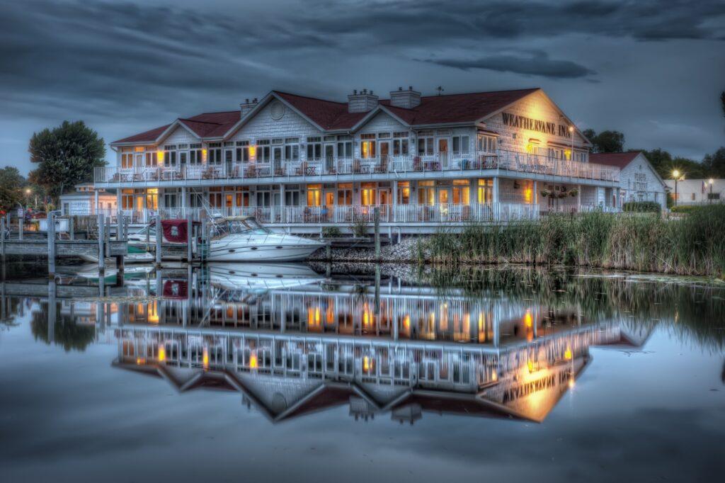Serene Riverside House Wallpaper: Evening Glow & Reflective River