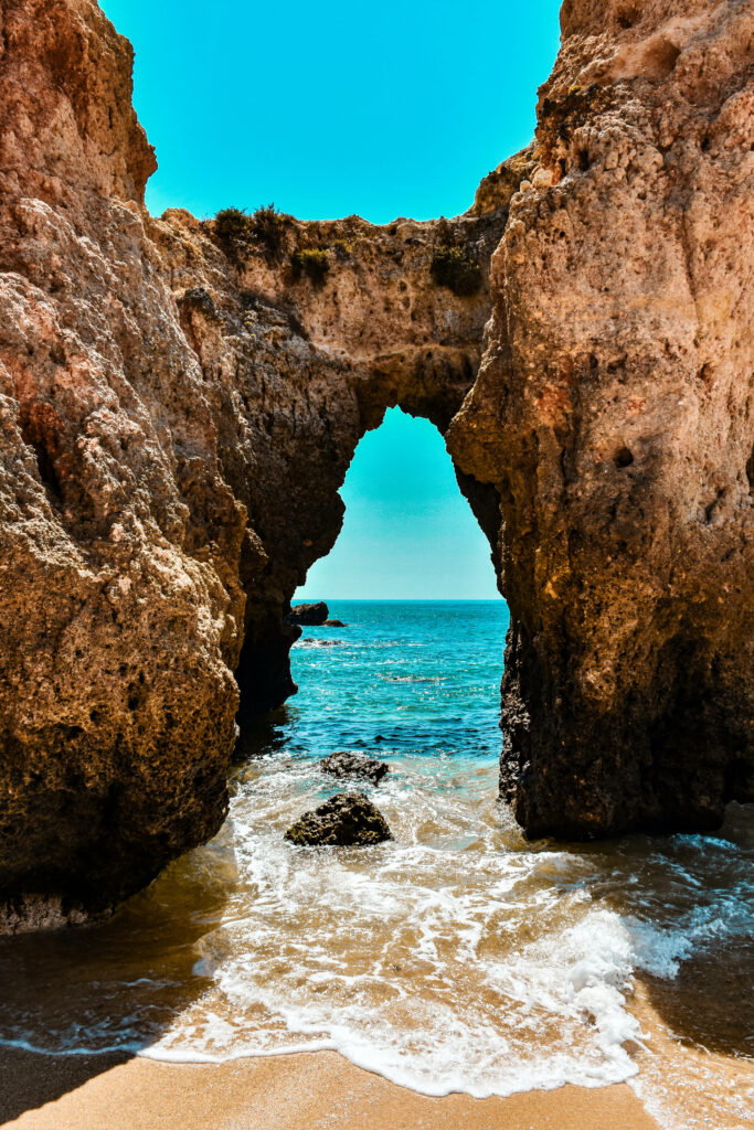Stunning Rocky Arch Beach Wallpaper for Android | Nature's Beauty