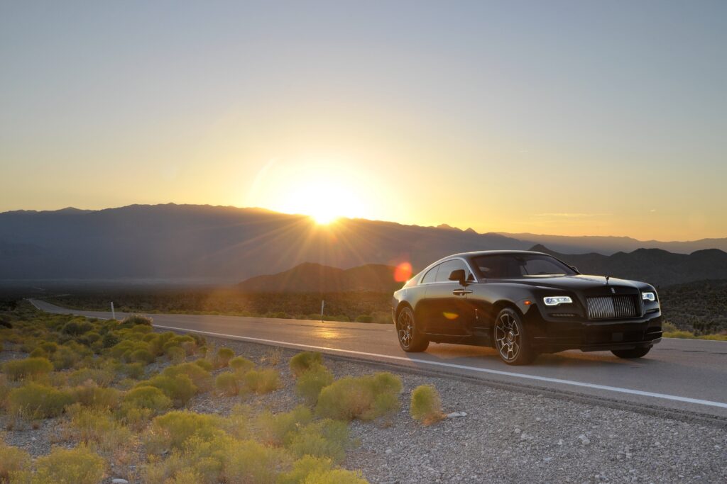 Stunning Rolls-Royce Wraith Wallpaper: Scenic Sunset Road View