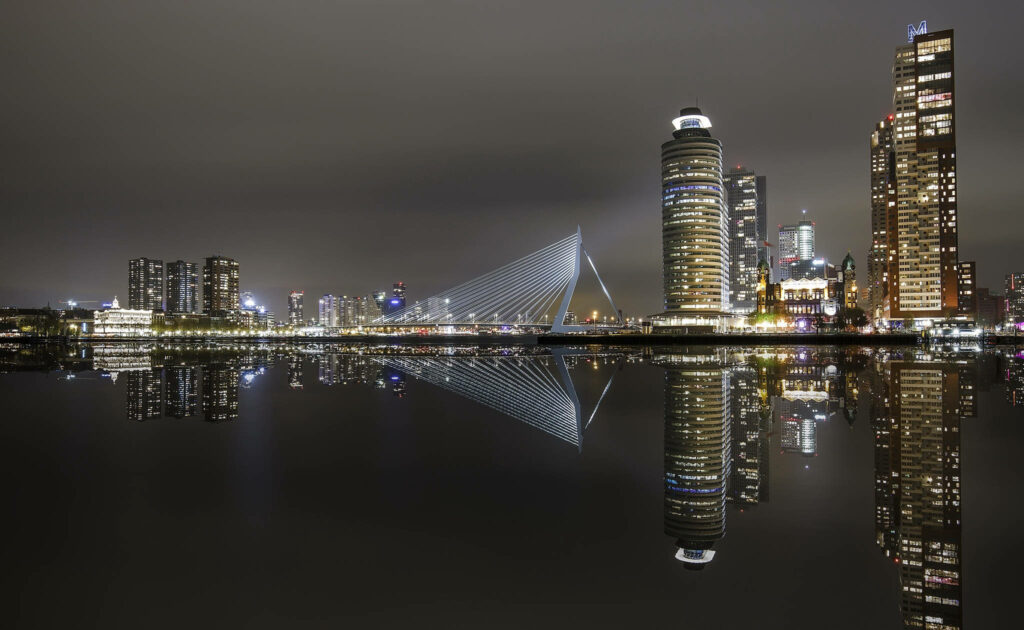 Stunning Rotterdam Nightscape: Erasmus Bridge Reflection Wallpaper