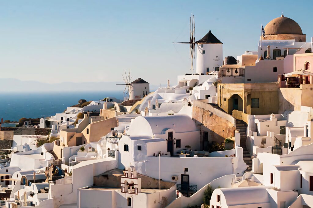 Stunning Santorini Wallpaper: Whitewashed Architecture & Blue Sky