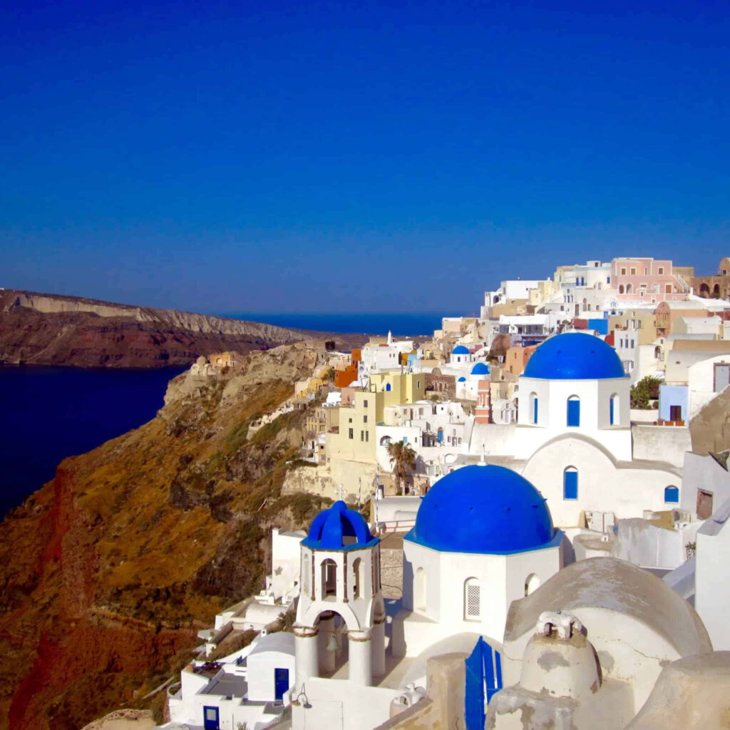 Stunning Santorini Wallpaper: Iconic White Buildings & Aegean Sea