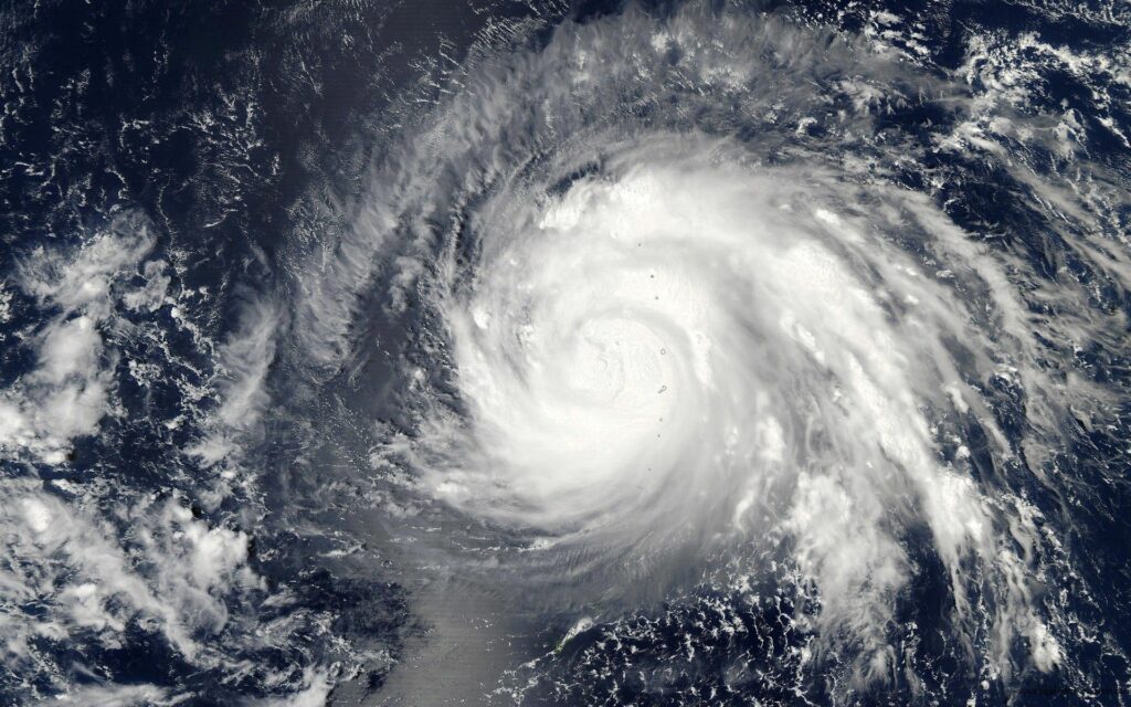 Stunning Satellite View Wallpaper of Cyclone Over Deep Blue Ocean