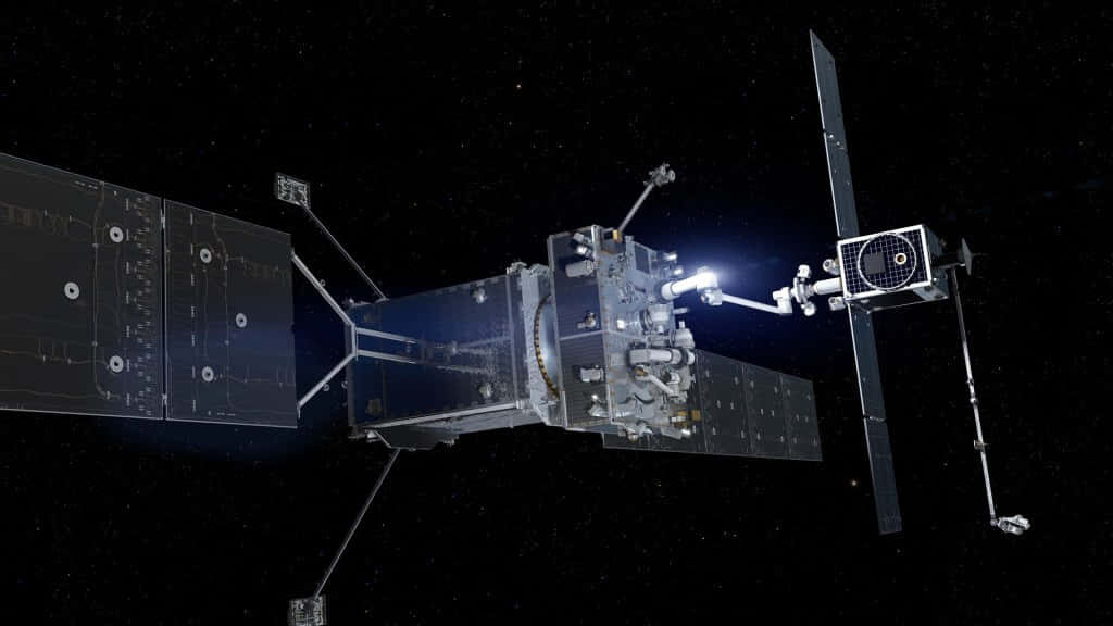 Intricate Satellite Orbiting Earth - Stunning Space Wallpaper
