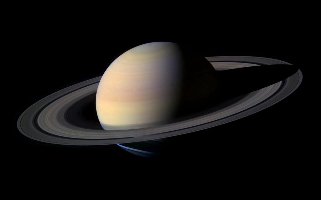 Stunning Saturn Wallpaper: Iconic Rings on Dark Space Background