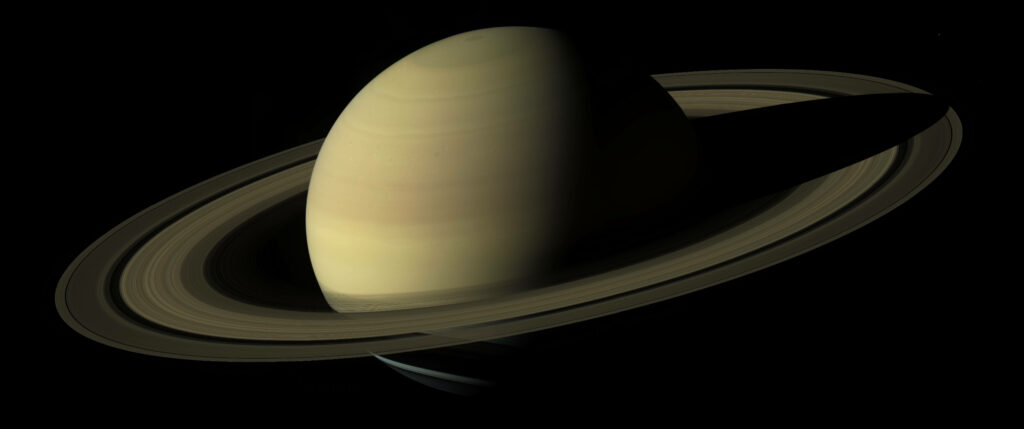 Stunning Saturn Wallpaper: Iconic Rings Against Dark Space Background