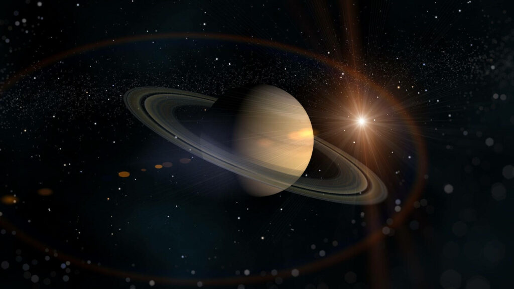 Stunning Saturn Wallpaper: Illuminated Rings in Starry Space