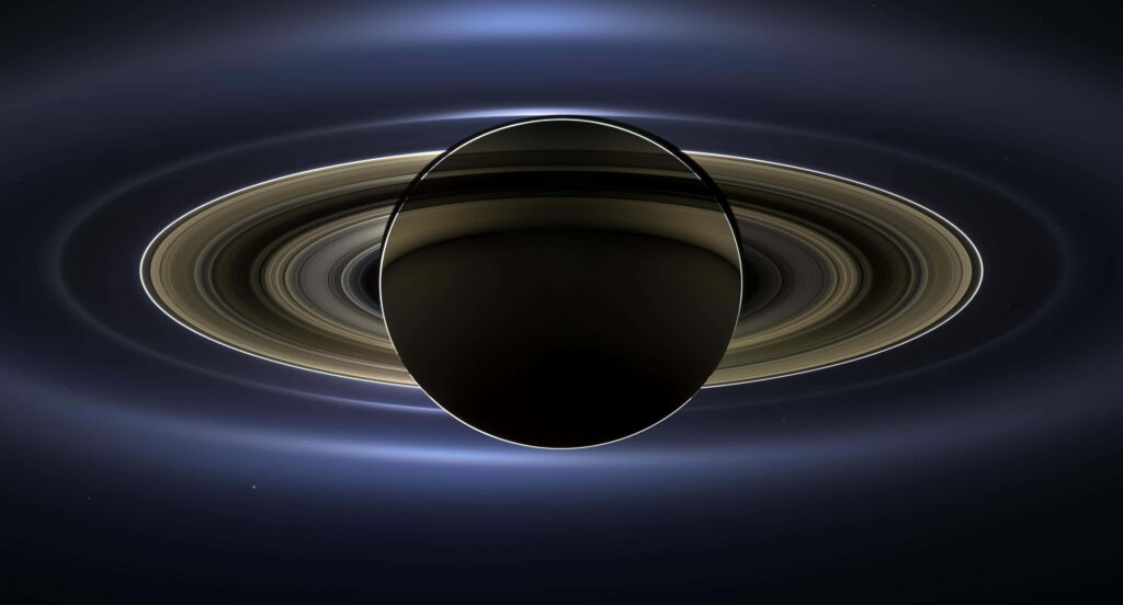 Stunning Saturn Wallpaper: Iconic Rings on a Dark Cosmic Background