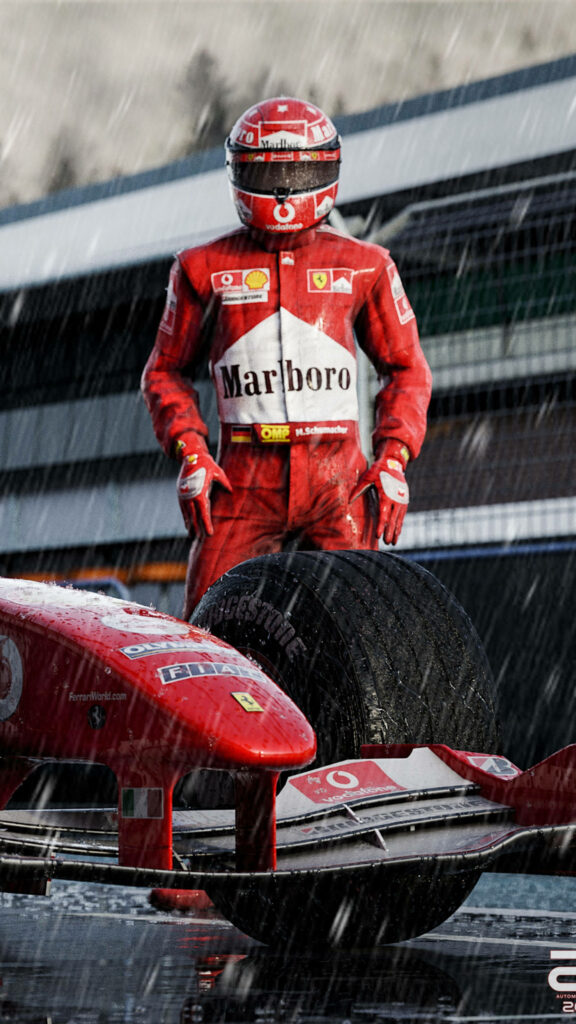 Iconic Michael Schumacher Wallpaper: F1 Legend in Red Racing Suit