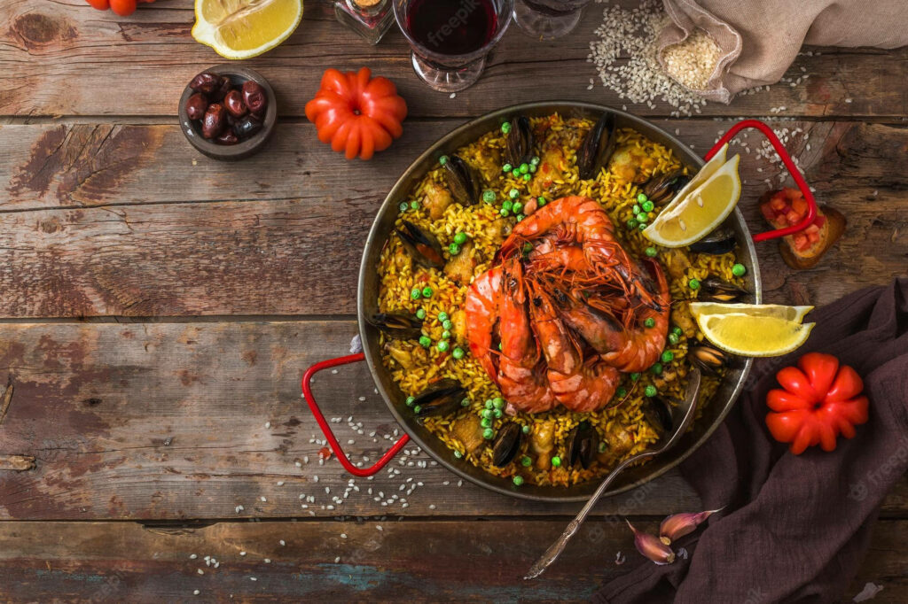 Vibrant Seafood Paella Wallpaper: Prawns, Mussels & Fresh Garnishes