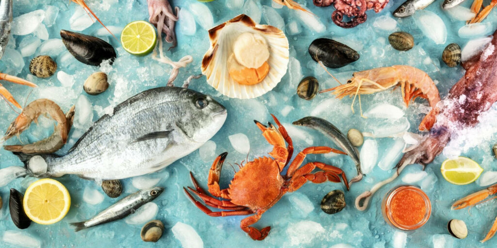 Vibrant Seafood Wallpaper: Fish, Shrimp, Crab & Shellfish on Ice