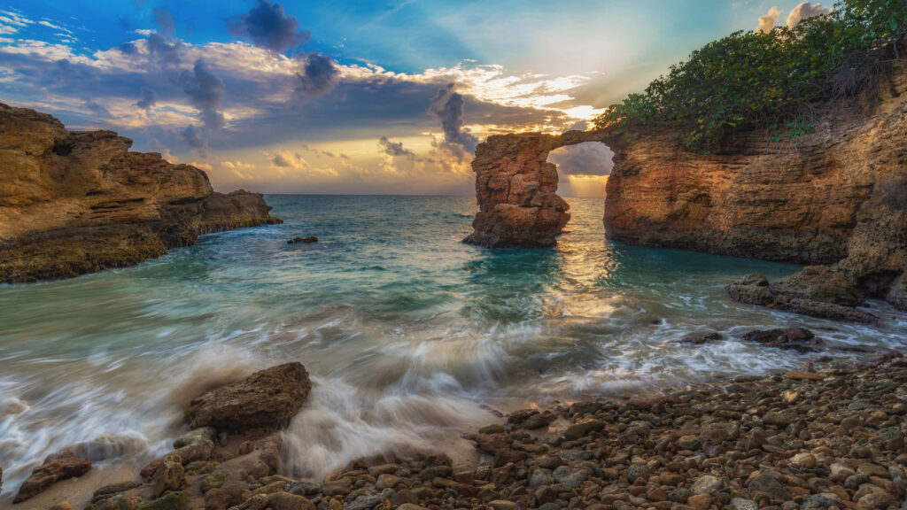 Stunning Seascape Wallpaper: Golden Sunset Over Ocean Arch