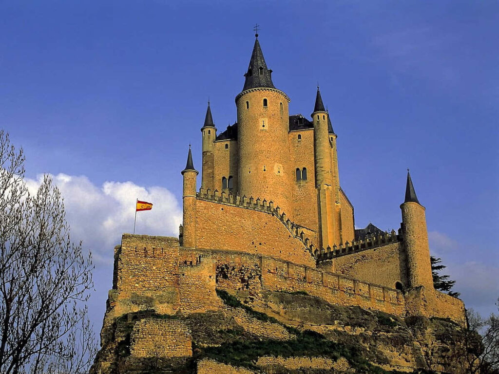 Stunning Segovia Castle Wallpaper: Medieval Architecture & Spanish Flag