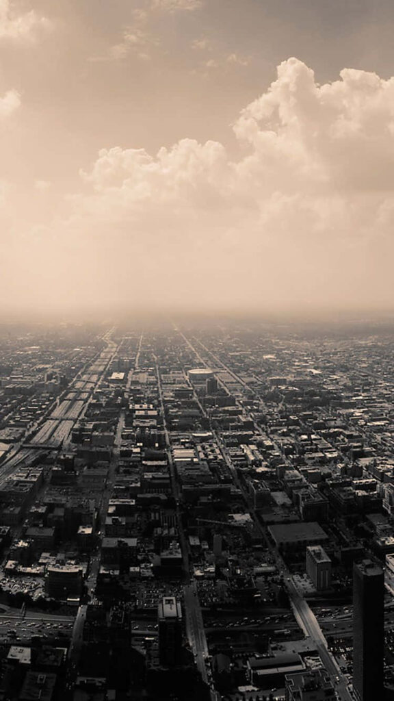 Stunning Sepia Cityscape Wallpaper: Aerial Urban Horizon View