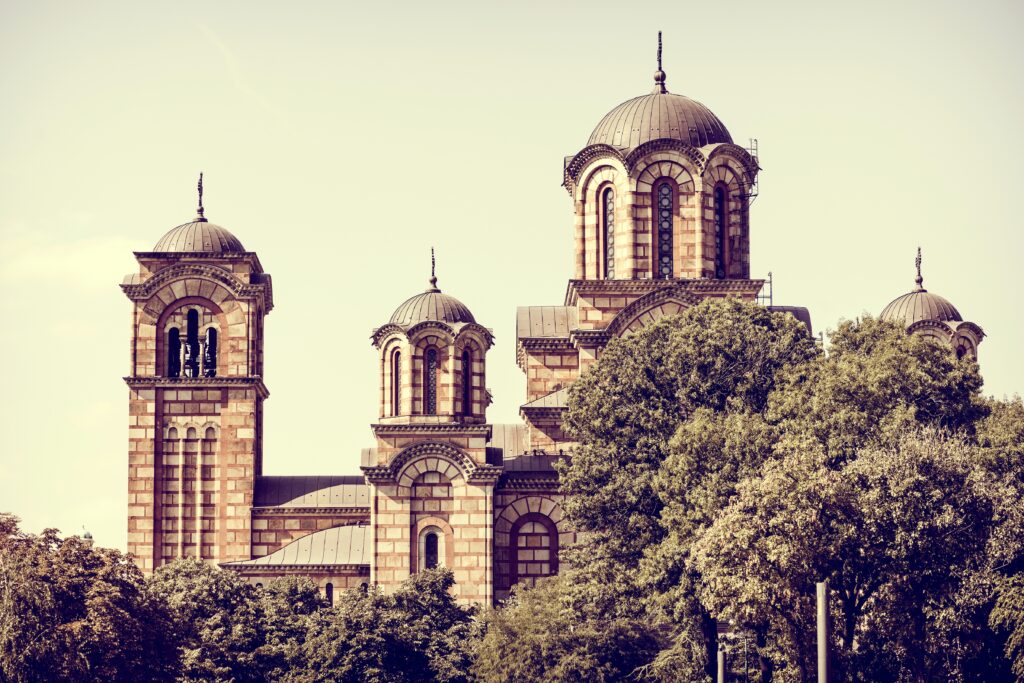 Stunning Serbian Church Wallpaper: Intricate Design & Lush Background