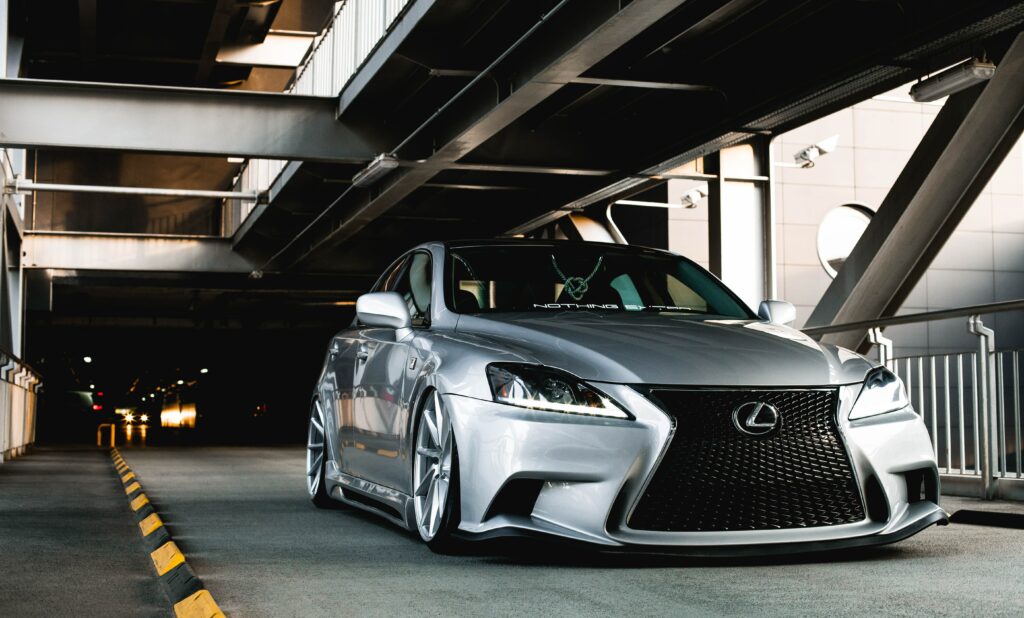 Sleek Silver Lexus IS: Stylish Tuning in Urban Setting Wallpaper
