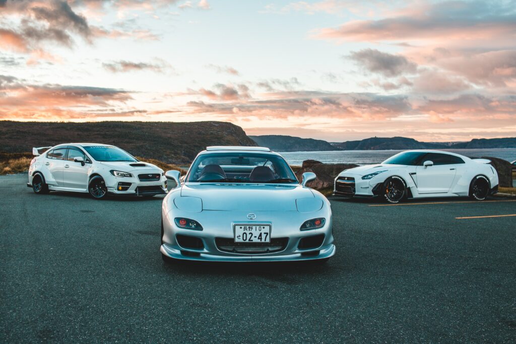 Silver Mazda RX-7 at Sunset: Sleek Design & Sporty Aesthetic Wallpaper