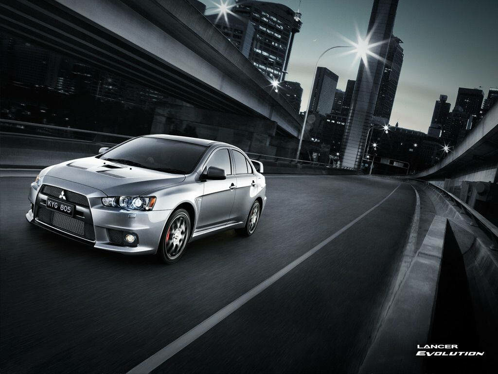 Stunning Silver Mitsubishi Lancer Evolution Night City Wallpaper