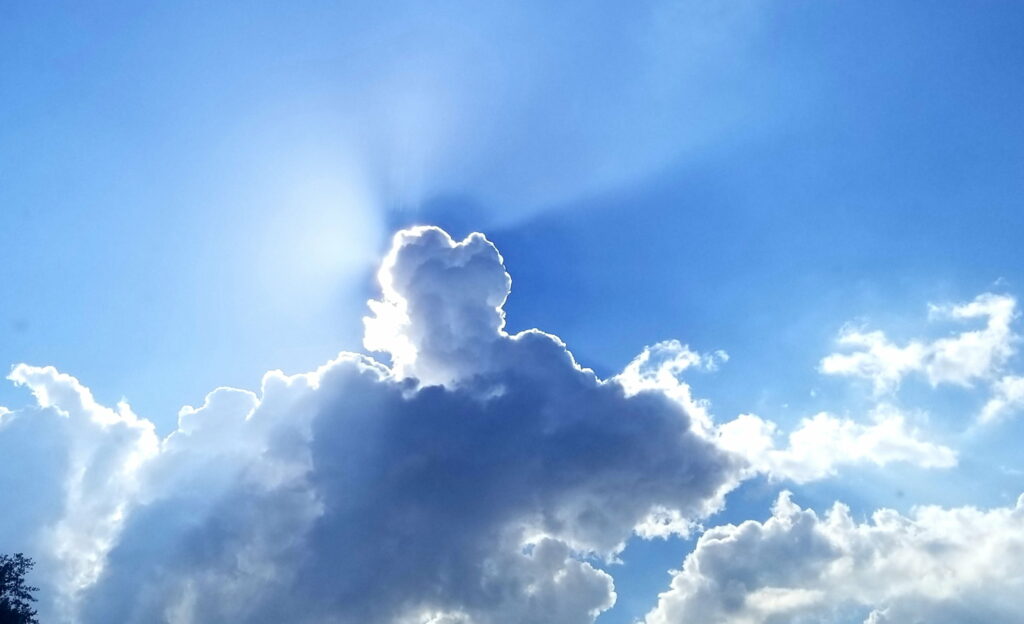 Radiant Sky Wallpaper: Stunning Clouds & Sunshine Background