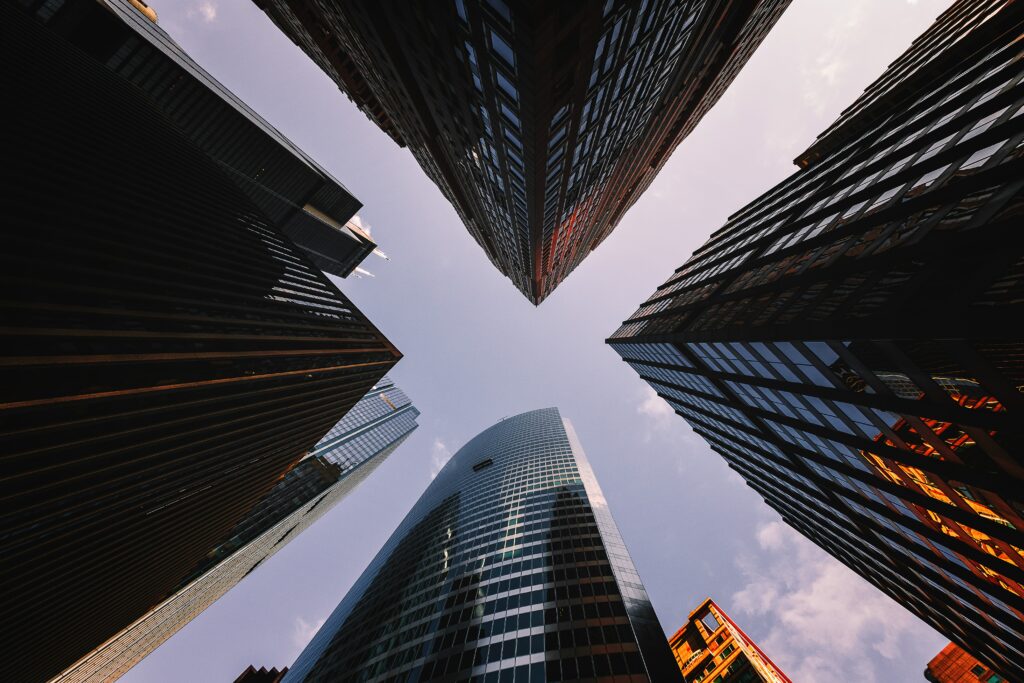 Stunning Skyscraper Wallpaper: Modern Architecture Against Clear Sky