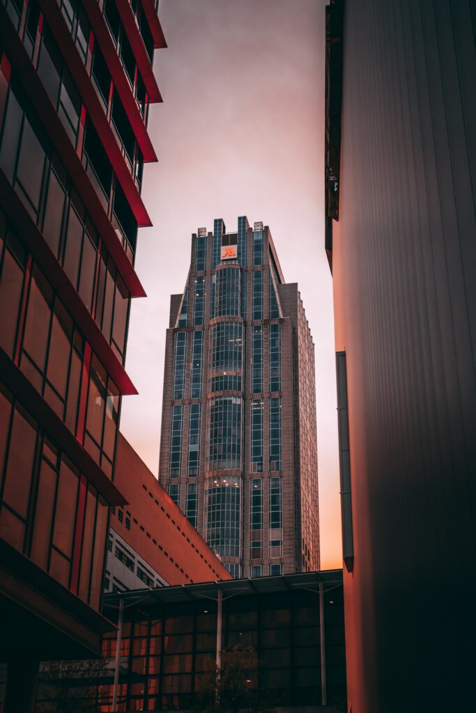 Stunning Skyscraper Wallpaper: Modern Architecture at Sunset