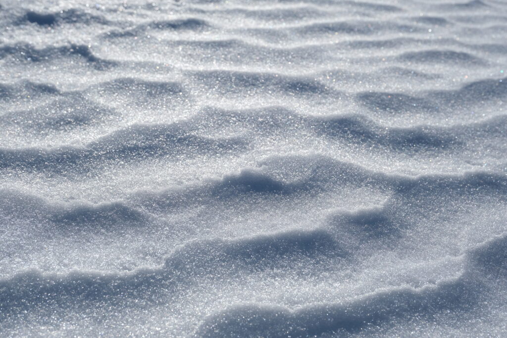 Stunning Snow-Covered Waves: Intricate Winter Texture Wallpaper