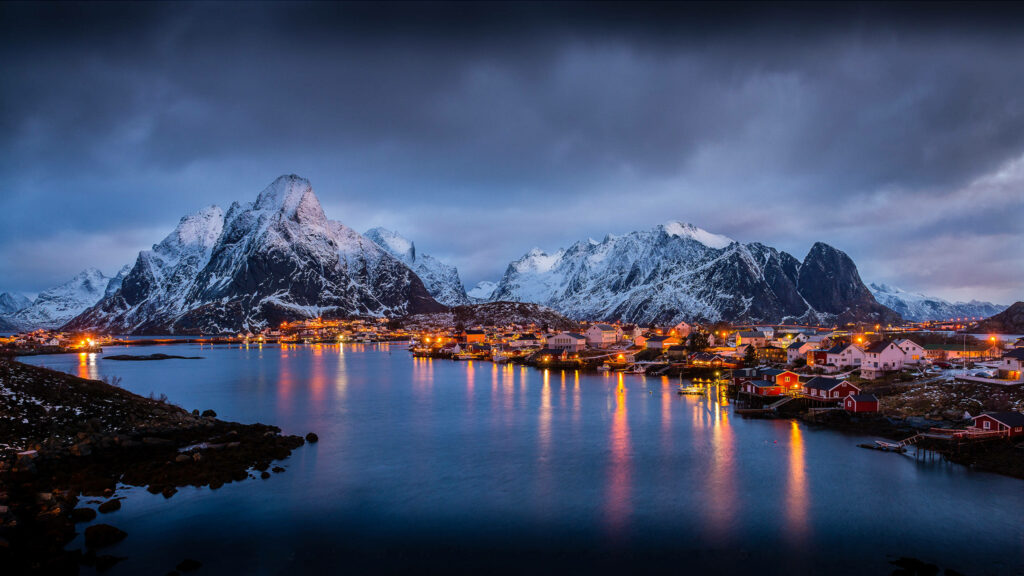 Stunning Mountain Night Wallpaper with Reflected Village Lights