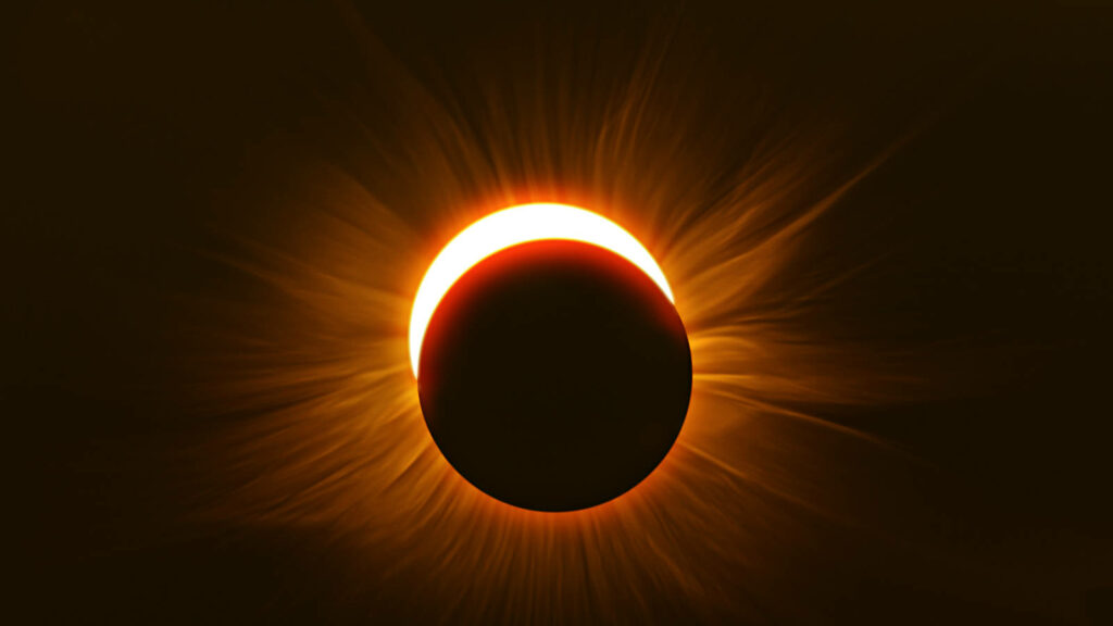 Stunning Solar Eclipse Wallpaper: Fiery Corona at Mid-Point