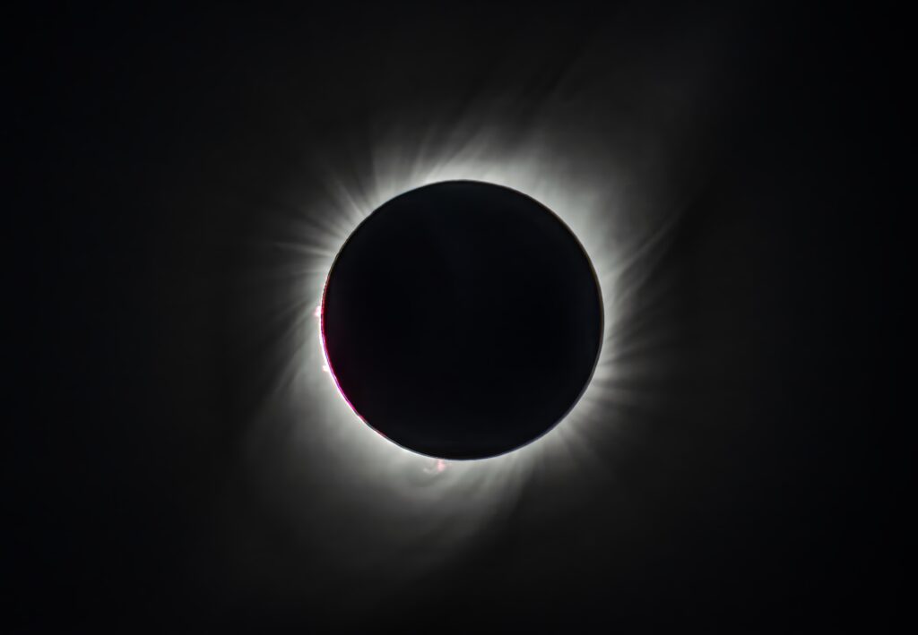 Stunning Solar Eclipse Wallpaper: Moon & Sun in Ethereal Black-and-White
