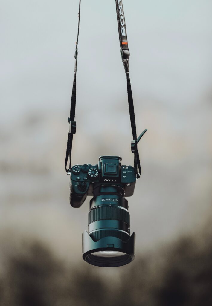 Stunning Black Sony Camera Wallpaper with Blurred Background