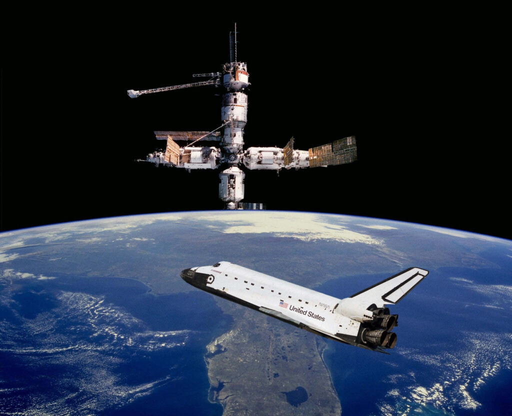 Stunning Space Shuttle Over Earth: Wallpaper Background with Space Station