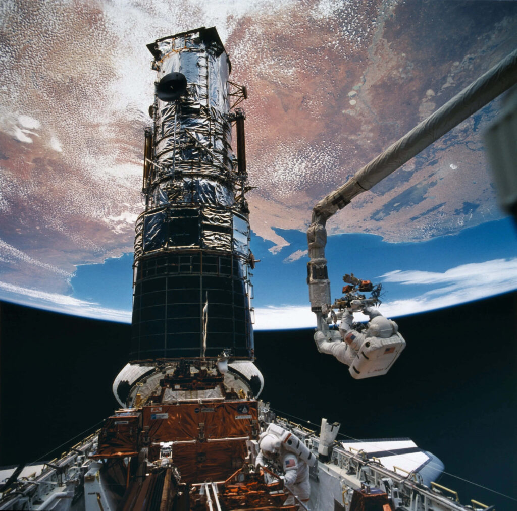 Stunning Space Telescope Wallpaper: Astronauts & Space Exploration