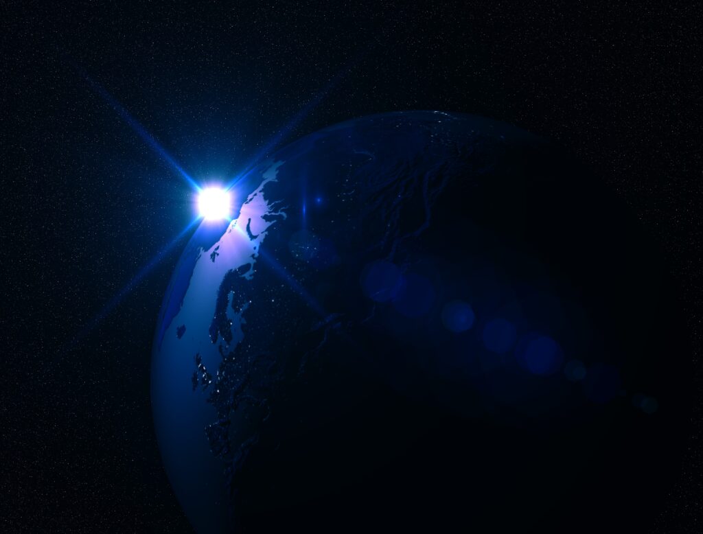 Stunning Space Wallpaper: Glowing Planet & Radiant Star Background