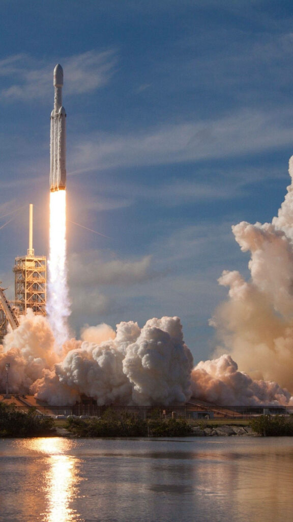 Falcon Heavy Launch Wallpaper: Stunning Rocket Takeoff Reflection