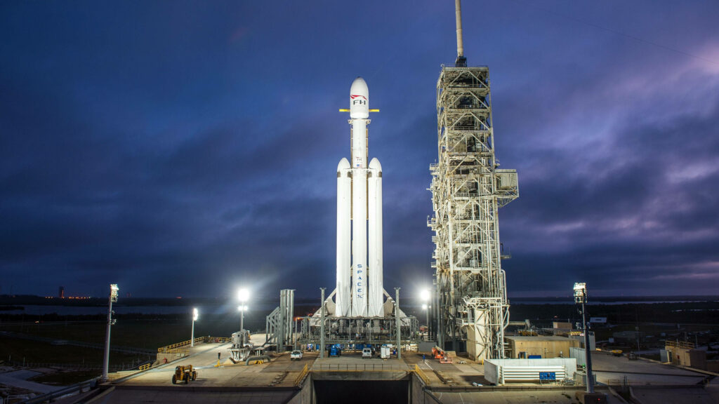 Stunning Falcon Heavy Wallpaper: SpaceX Rocket at Night