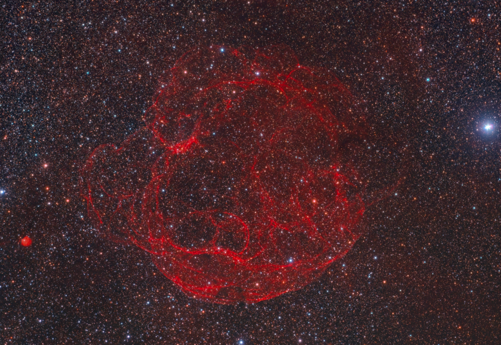 Vibrant Spaghetti Nebula Wallpaper: Stunning Red Filaments & Stars