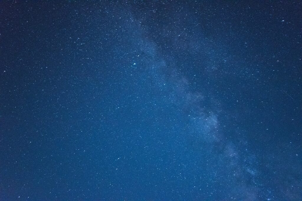 Stunning Starry Sky Wallpaper: Cosmic Blue Galaxy Background