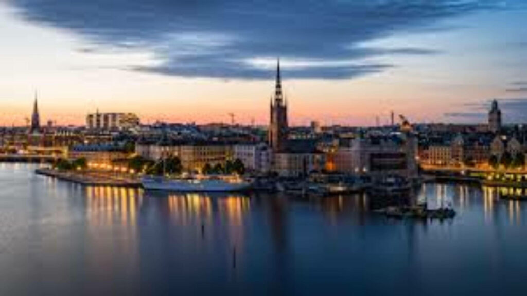 Serene Stockholm Wallpaper: Iconic Architecture & Calm Waterfront