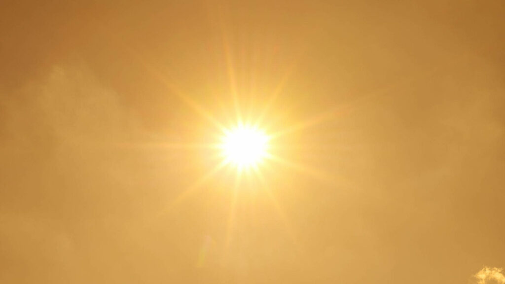Stunning Sun Wallpaper: Radiant Golden Light & Energy Background