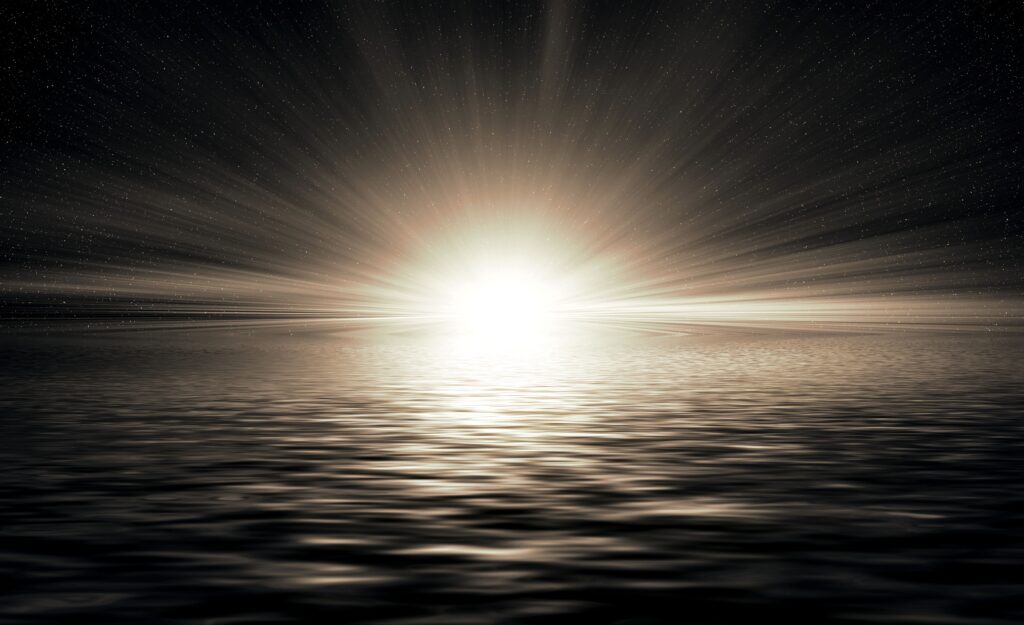 Serene Sunrise Wallpaper: Ethereal Sunlight Over Water Background