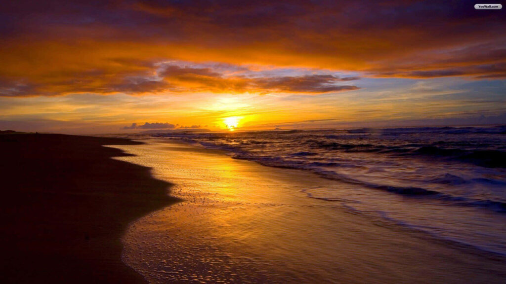 Vibrant Sunset Beach Scene: Ocean Waves & Dramatic Sky Background Wallpaper
