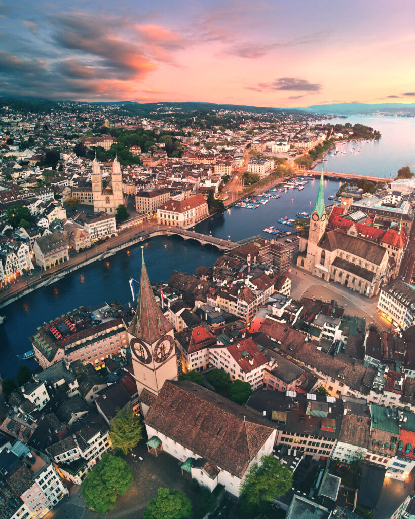 Stunning Aerial Cityscape Wallpaper: Sunset Over Historic Architecture