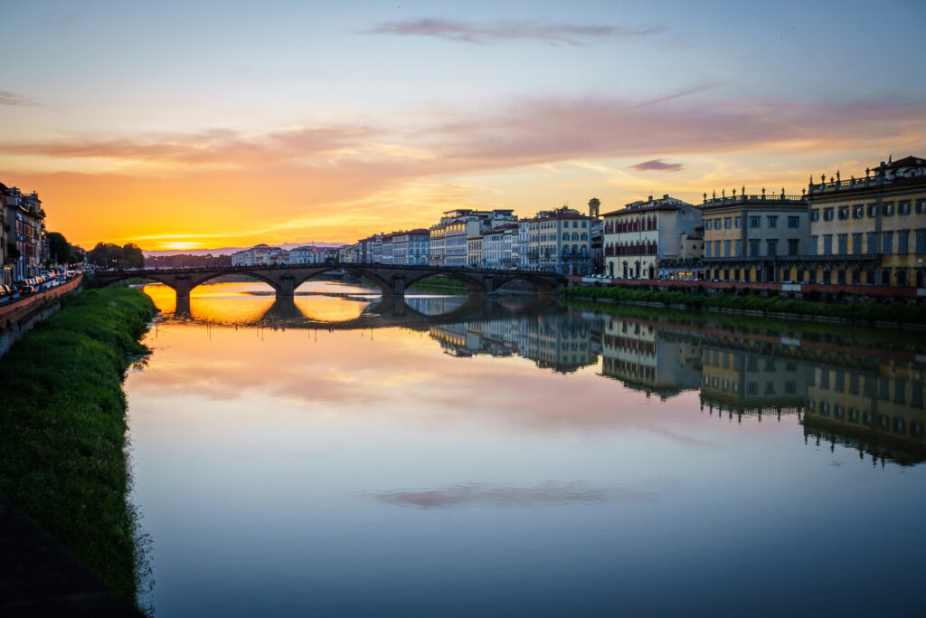 Stunning Sunset Cityscape Wallpaper: Lake & Bridge Reflection
